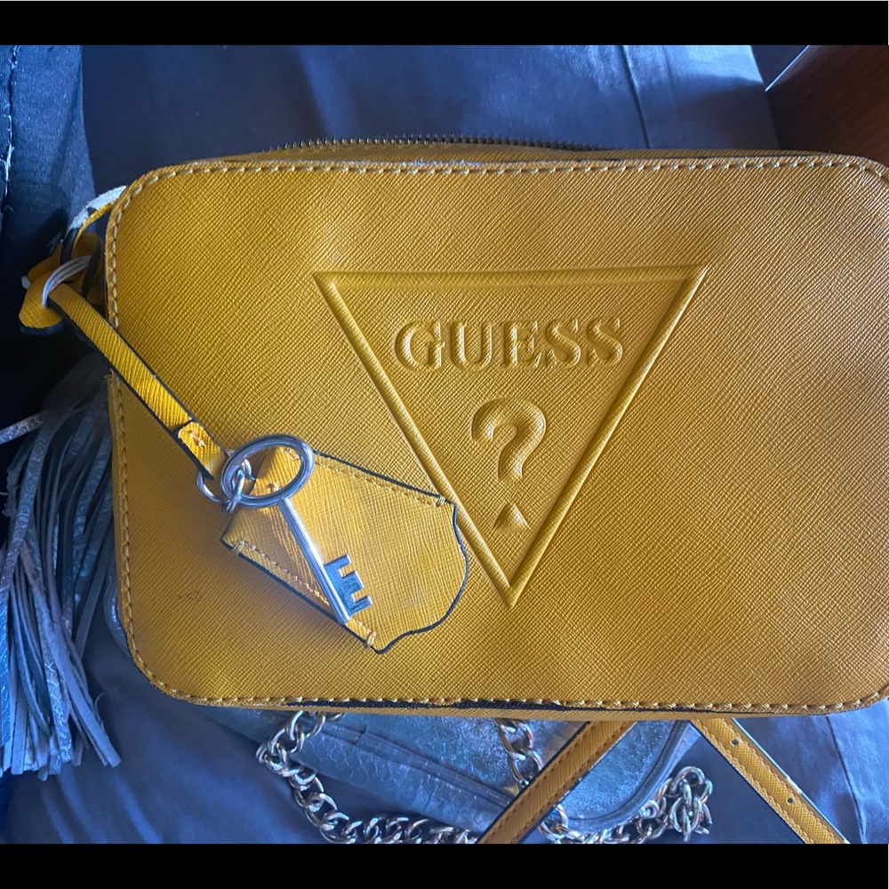 yellow cross body guess purse